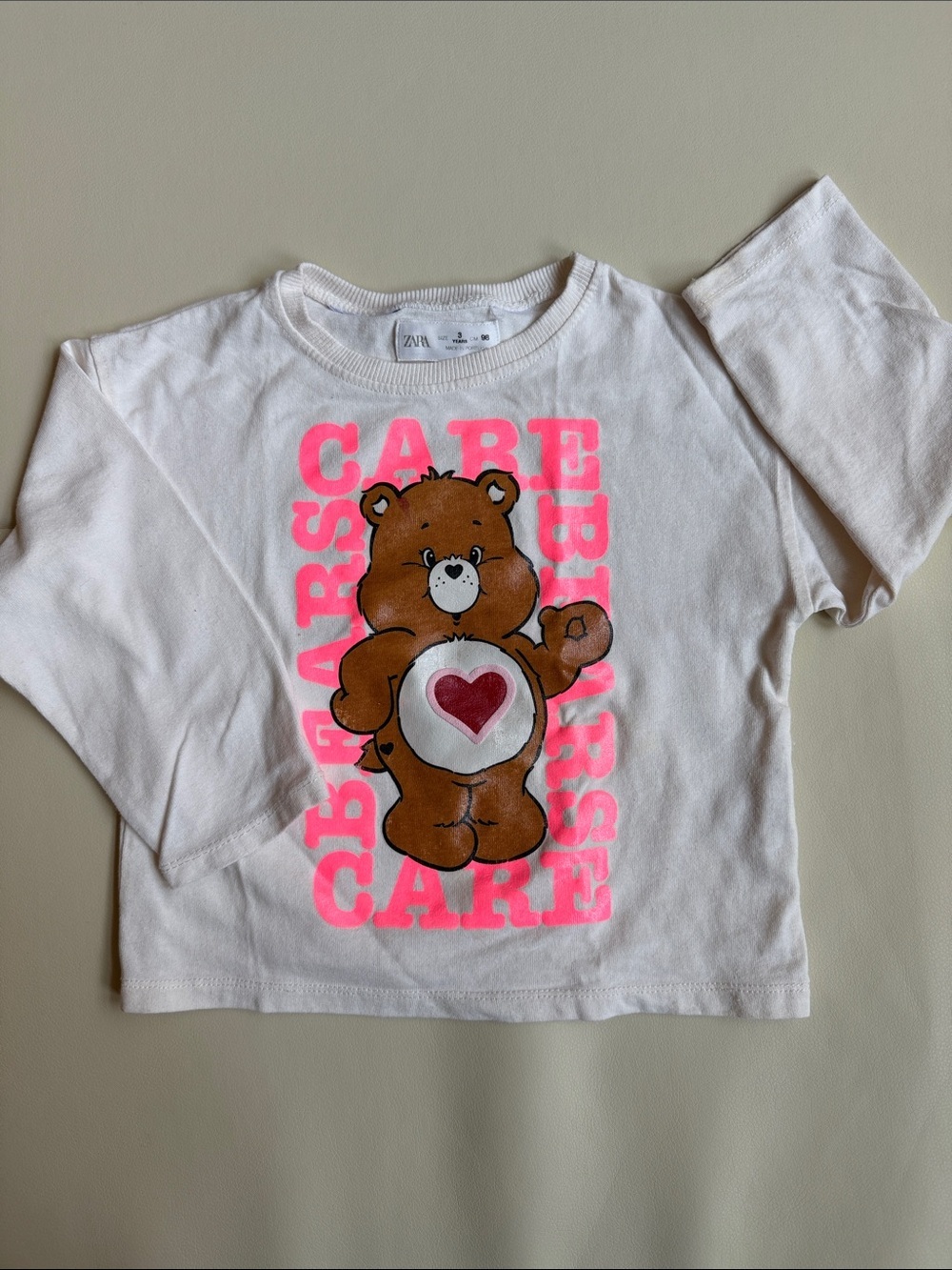Zara Girls White Long-Sleeve Care Bears Bear Heart Graphic Tee with Pink Text